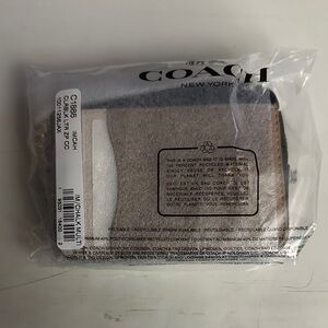 Coach Beige and Black Card Holder with metal wristlet band